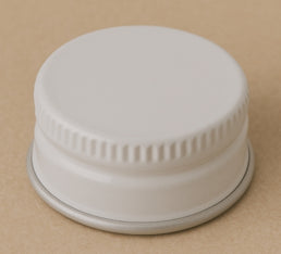 83R3 White Enamel Caps with PVDC Liner – Clean, Secure Bottle Closures